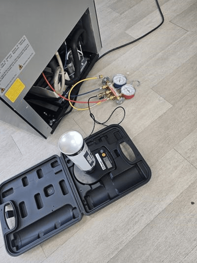 New evaporator coil being staged for installation during a reach-in freezer changeout