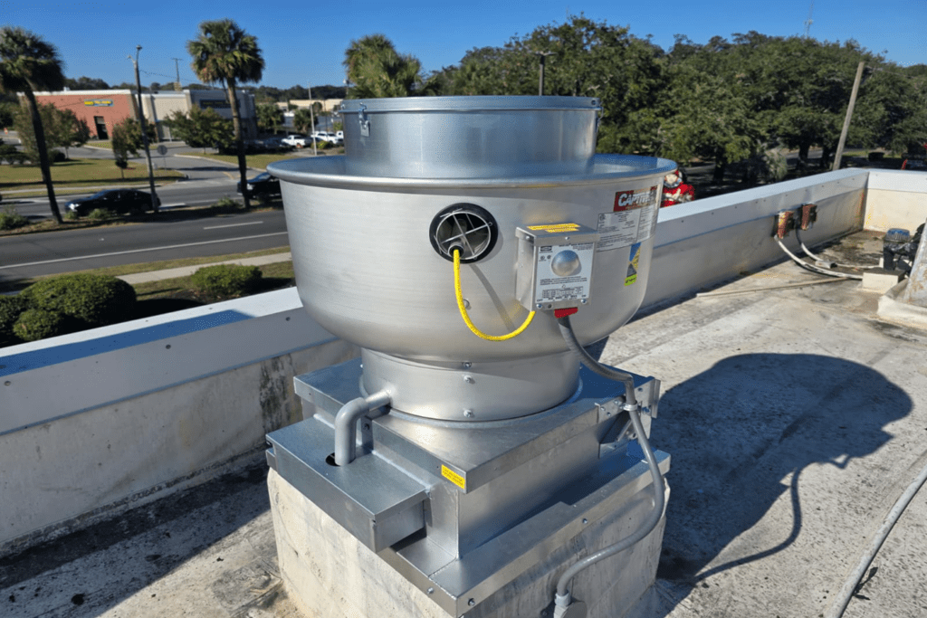 Electrical connections complete — yellow ground wire visible, connection box properly weatherproofed