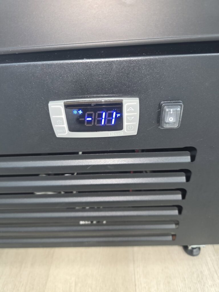 A digital refrigeration control display — monitoring these readings helps catch problems before they cause a shutdown.