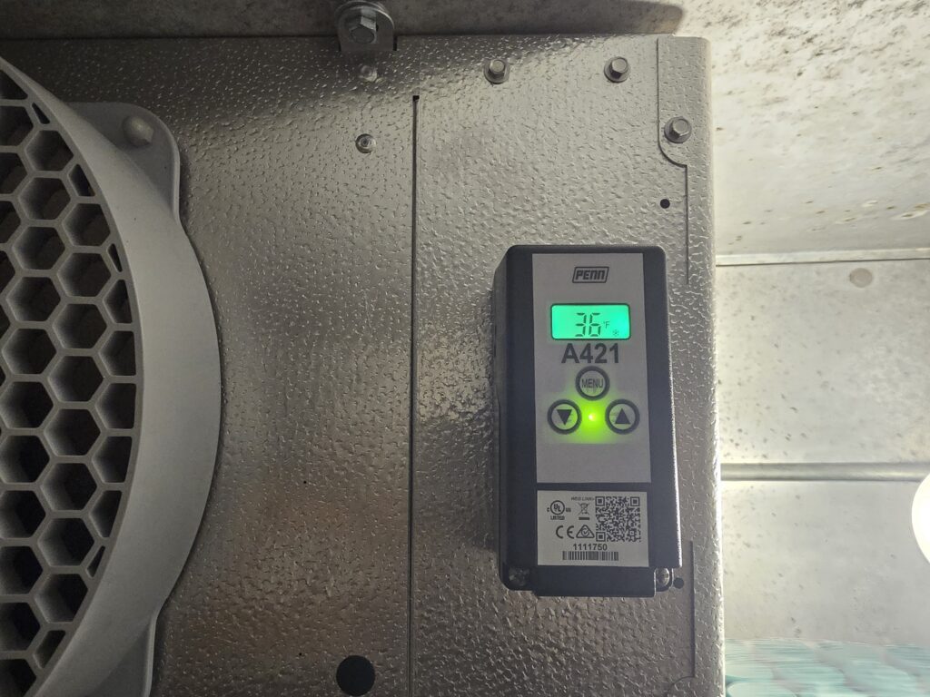 Penn A421 digital controller displaying a stable 36°F after installation.
