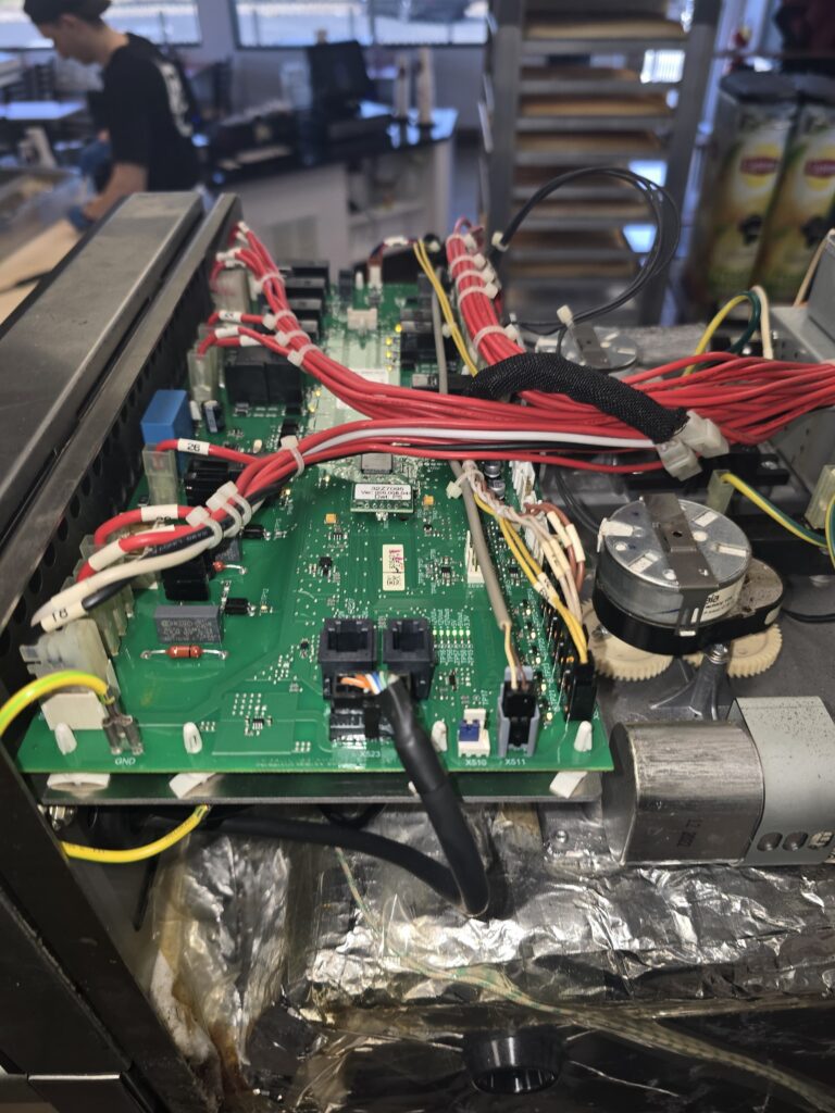 A control board pulled for inspection during a full diagnostic before resale.