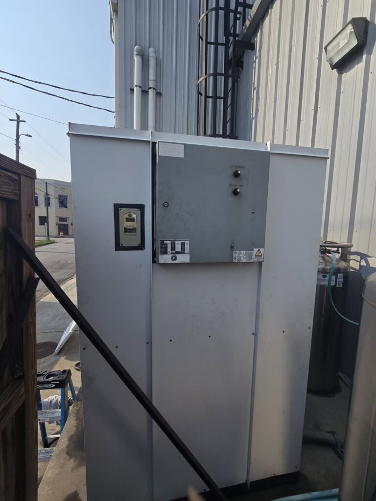 The control panel and thermostat cabinet were checked first to confirm power, control settings, and pump operation.