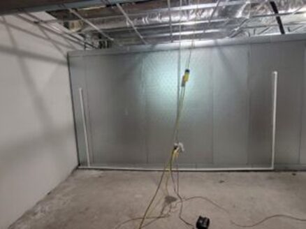 Panels going up inside a prepared room.