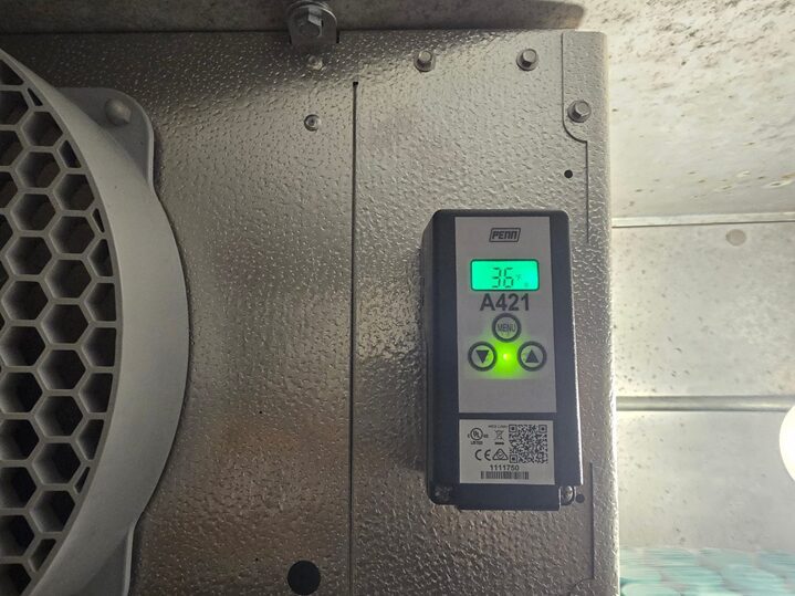 A Penn A421 electronic controller reading 36°F. This is a healthy reading, so check yours against an independent thermometer.